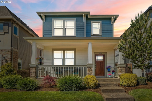 view of front of home featuring covered porch