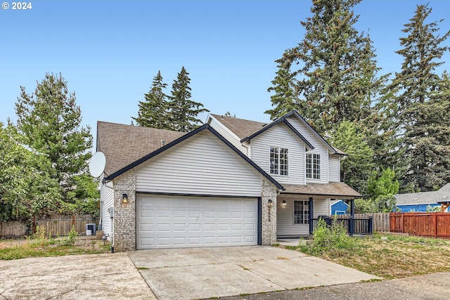 front of property with a garage