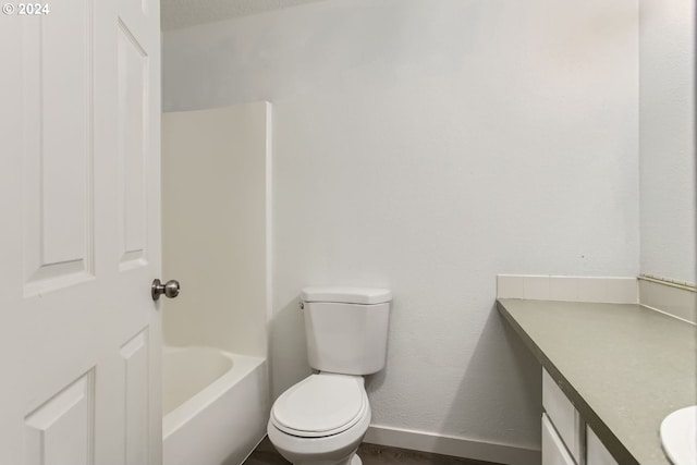 full bathroom featuring vanity, toilet, and separate shower and tub