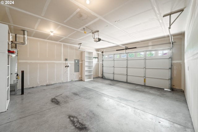 garage with electric panel, a garage door opener, and heating unit