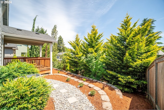 view of yard featuring a deck