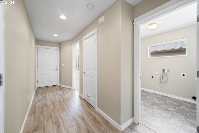 corridor featuring light hardwood / wood-style flooring