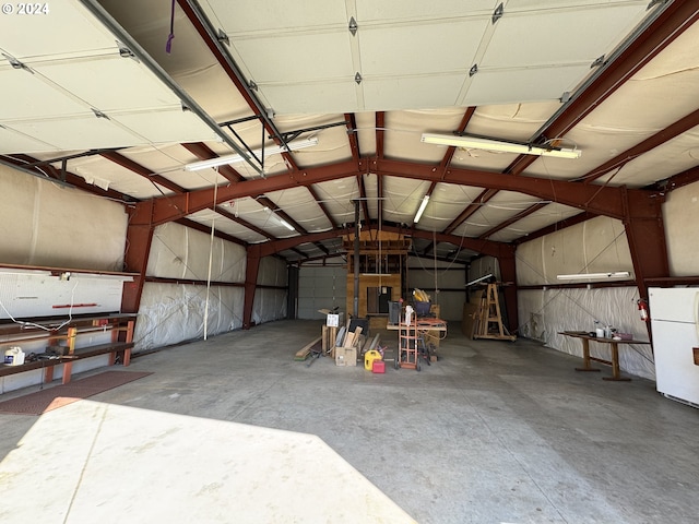 garage with freestanding refrigerator