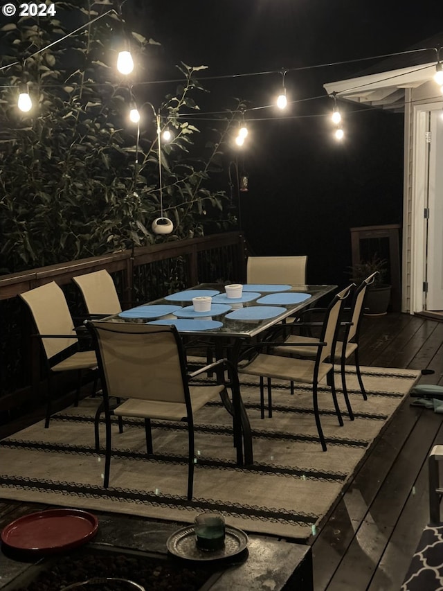 patio at twilight with a wooden deck