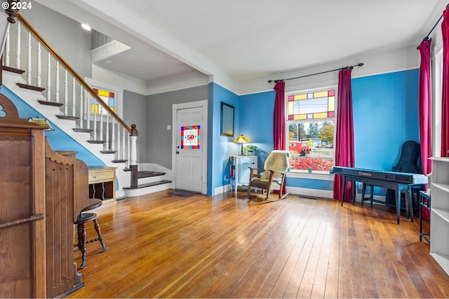 entryway with hardwood / wood-style floors