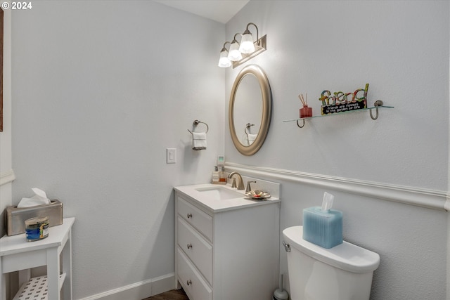 half bath with toilet and vanity