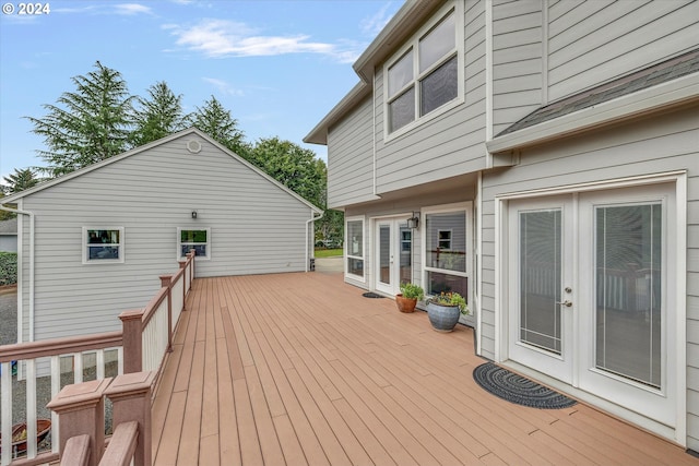 wooden terrace featuring french doors