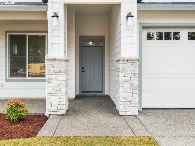 entrance to property featuring a garage