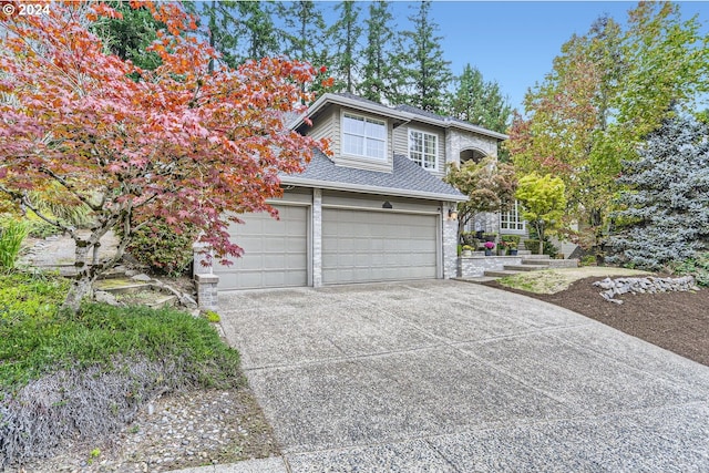 view of front of home with a garage