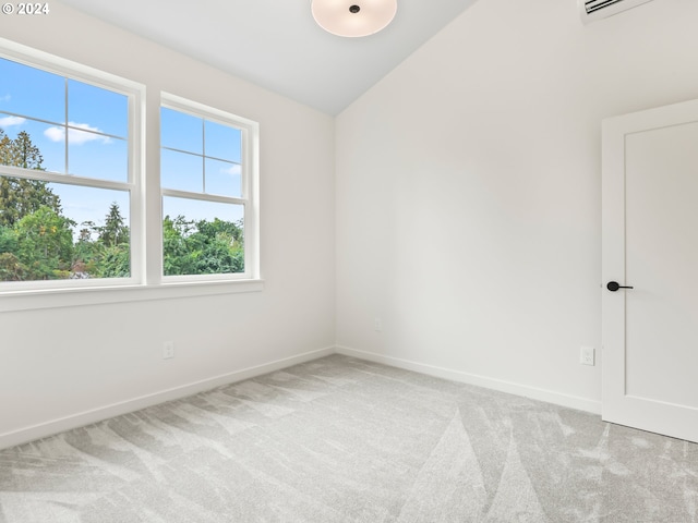 unfurnished room featuring light carpet, baseboards, and vaulted ceiling