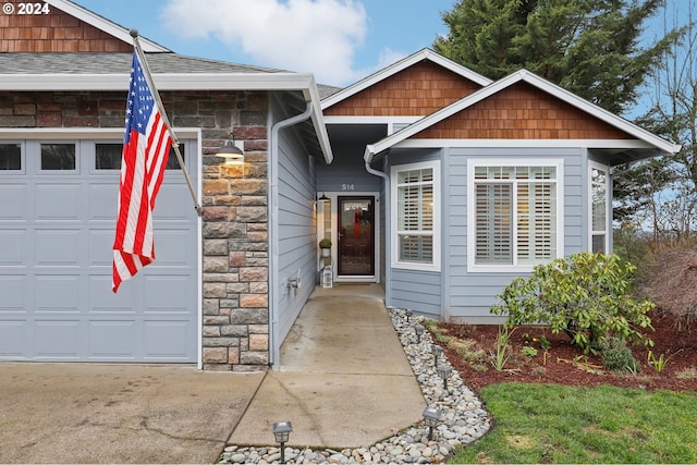 property entrance featuring a garage