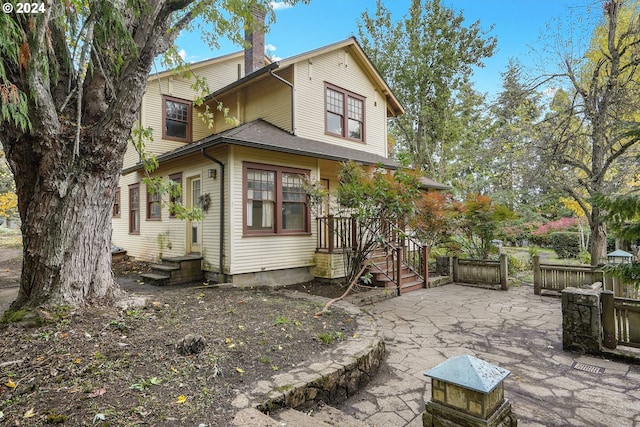 back of house featuring a patio area