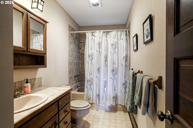 full bathroom with vanity, toilet, and shower / bathtub combination with curtain