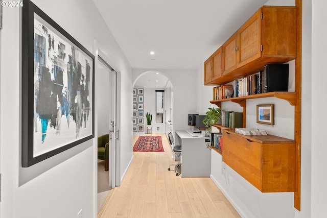 1150 NW Quimby St Unit 208, Portland, OR 97209 - office with arched walkways, light wood-style floors, and recessed lighting