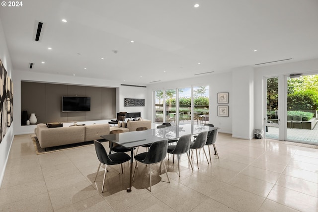 dining area featuring a wealth of natural light