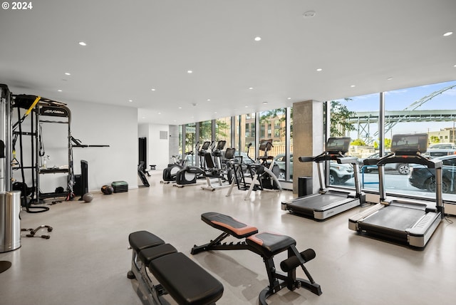 1150 NW Quimby St Unit 208, Portland, OR 97209 - gym featuring a wall of windows and recessed lighting