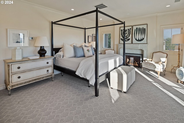 carpeted bedroom featuring ornamental molding