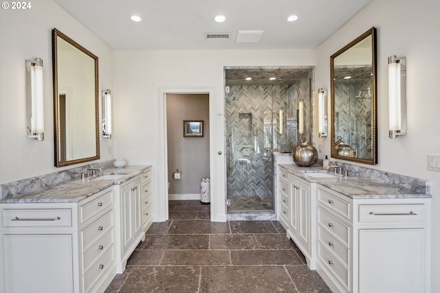 bathroom featuring vanity, toilet, and a shower with shower door