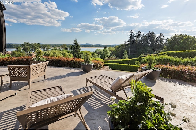 view of patio / terrace featuring a water view