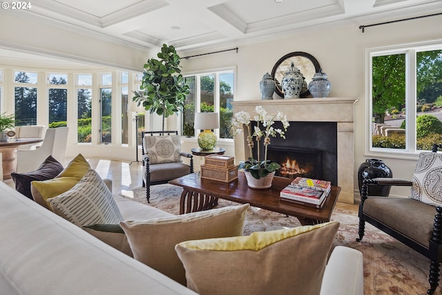 sunroom featuring coffered ceiling, beamed ceiling, and a high end fireplace