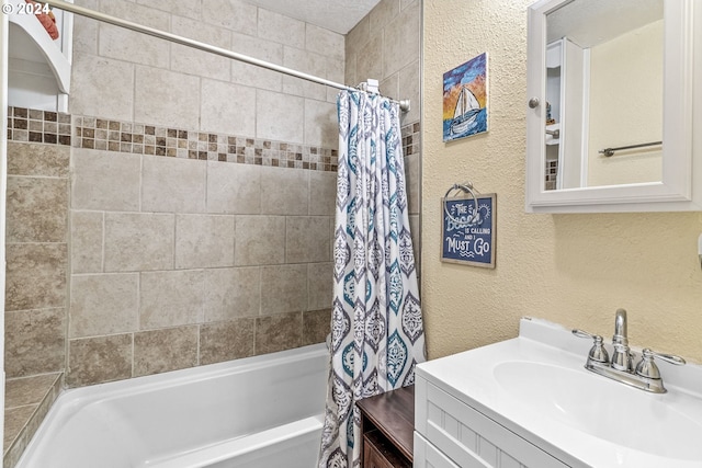 bathroom with shower / bath combo and vanity