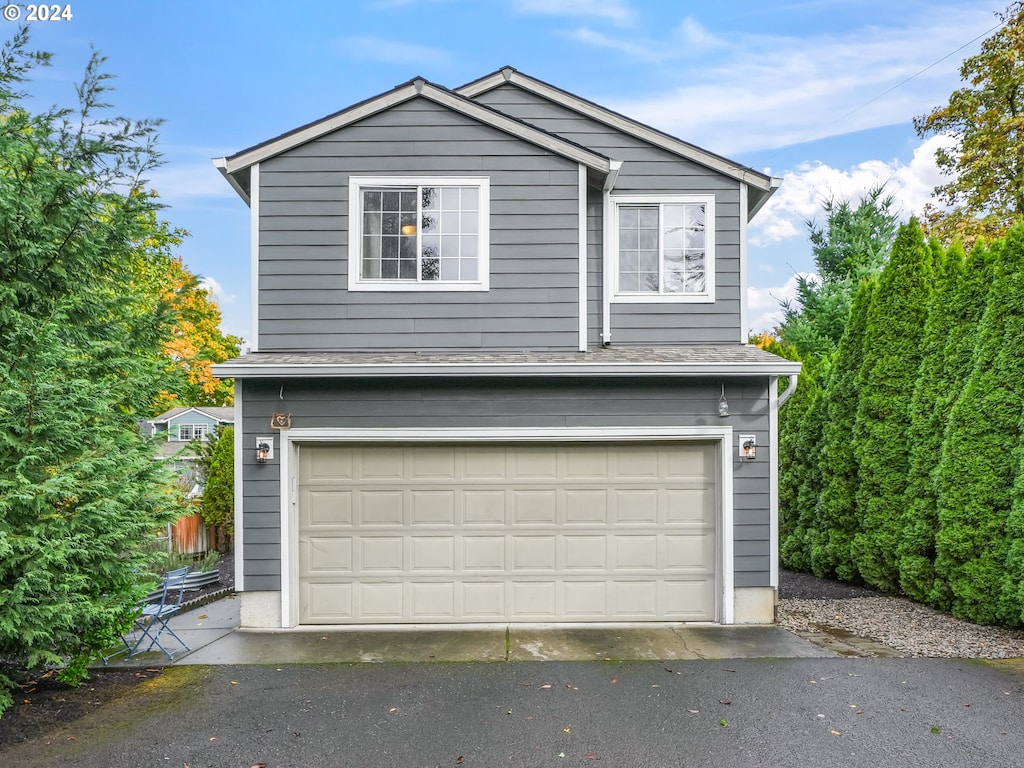 exterior space featuring a garage