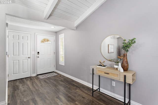 entryway with lofted ceiling with beams and dark hardwood / wood-style floors