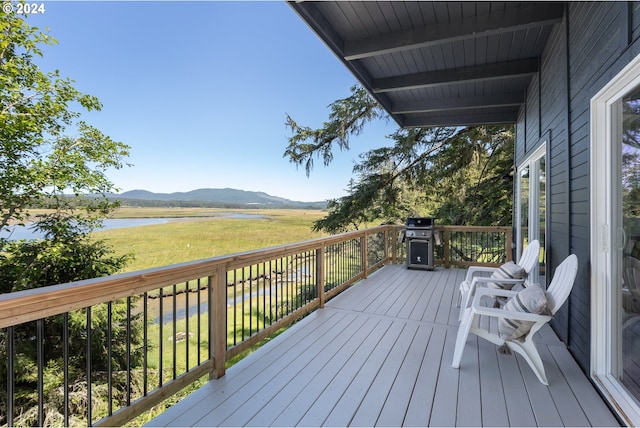 25120 Sandlake Rd, Cloverdale, OR 97112 - deck featuring a water and mountain view