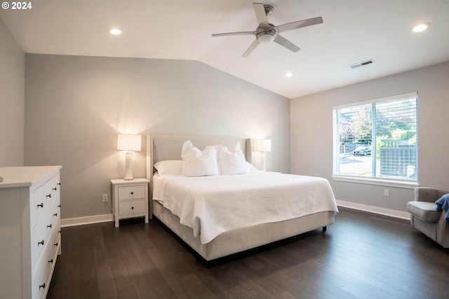 bedroom with dark hardwood / wood-style floors, ceiling fan, and lofted ceiling