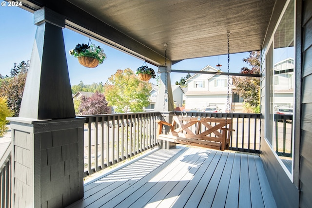 wooden terrace with a porch