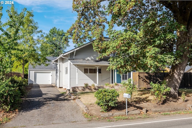 view of front of home featuring a garage and a porch