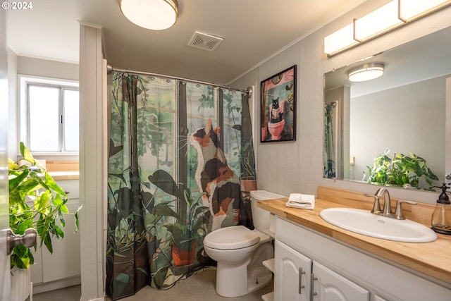 bathroom featuring ornamental molding, vanity, a shower with curtain, and toilet