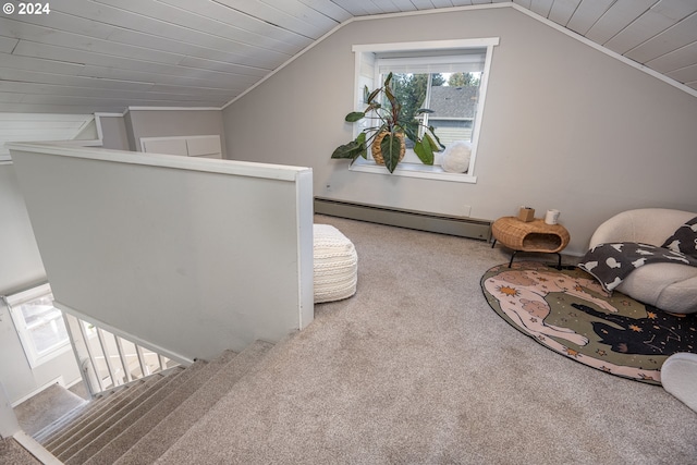 interior space with carpet floors, wood ceiling, vaulted ceiling, and a baseboard heating unit