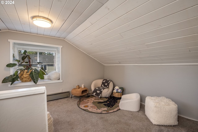 living area featuring carpet flooring, a baseboard radiator, and vaulted ceiling