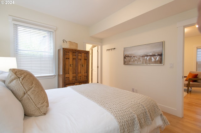 bedroom featuring light wood-type flooring