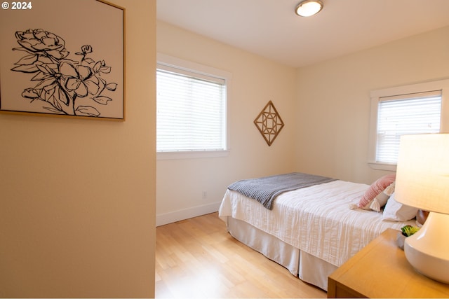 bedroom featuring light wood-type flooring