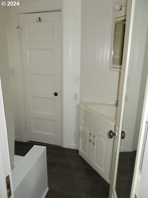 bathroom featuring hardwood / wood-style floors and vanity