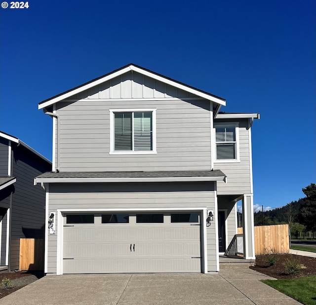 front of property with a garage