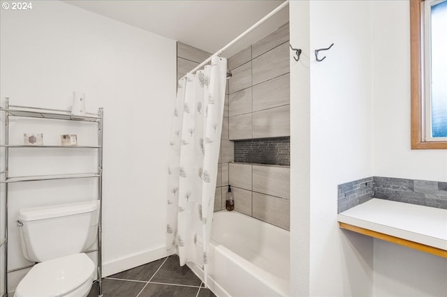 bathroom featuring tile patterned flooring, toilet, and shower / bath combo with shower curtain