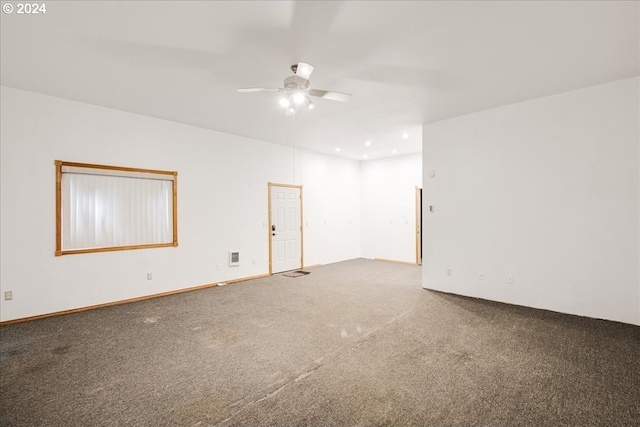 empty room with carpet and ceiling fan