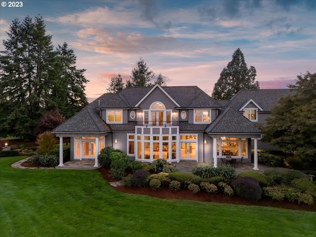 26065 SW Baker Rd, Sherwood, OR 97140 - rear view of house with french doors, roof with shingles, a balcony, a yard, and a patio