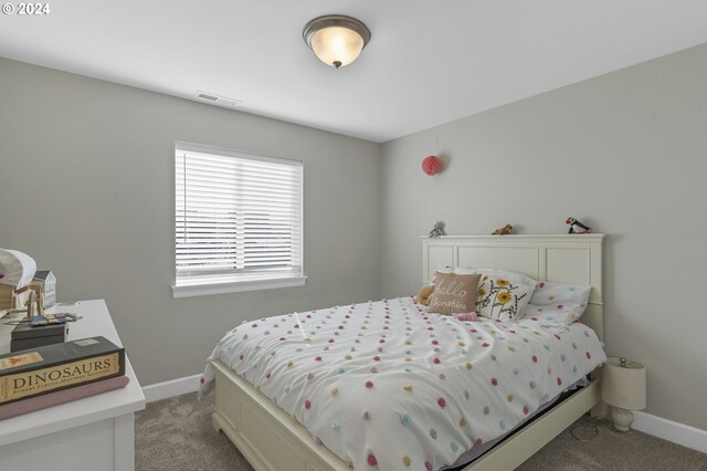 bedroom featuring carpet flooring