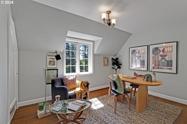 home office with a notable chandelier, vaulted ceiling, baseboards, and wood finished floors