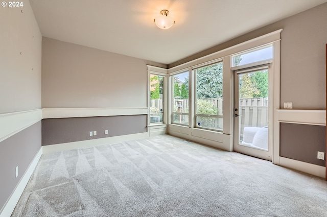 unfurnished room featuring carpet floors