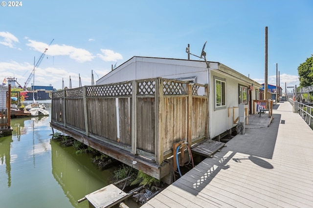 dock area featuring a water view