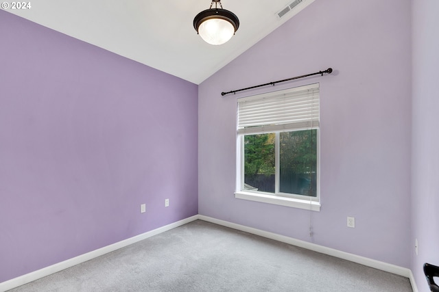 2067 NE 49th Way, Hillsboro, OR 97124 - spare room featuring carpet floors, baseboards, and lofted ceiling