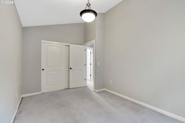 2067 NE 49th Way, Hillsboro, OR 97124 - empty room featuring carpet floors, baseboards, and high vaulted ceiling