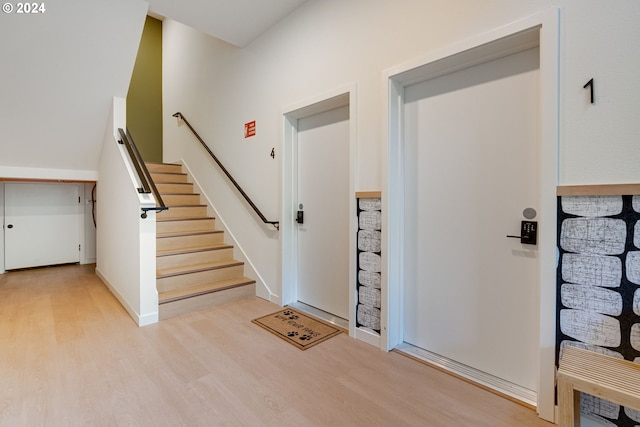 foyer with light wood-type flooring