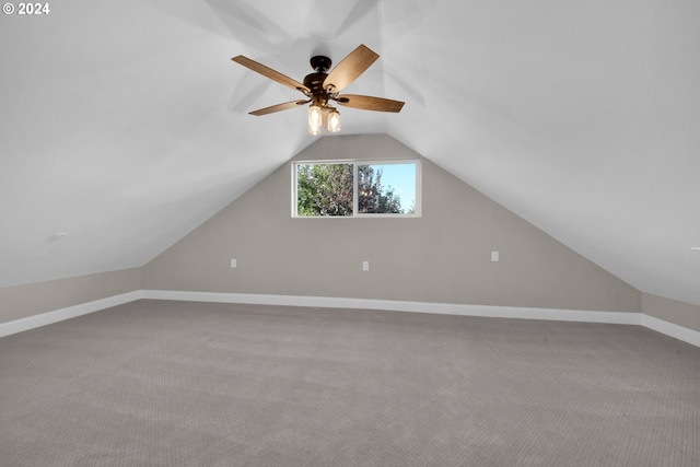 bonus room with lofted ceiling, carpet floors, and ceiling fan