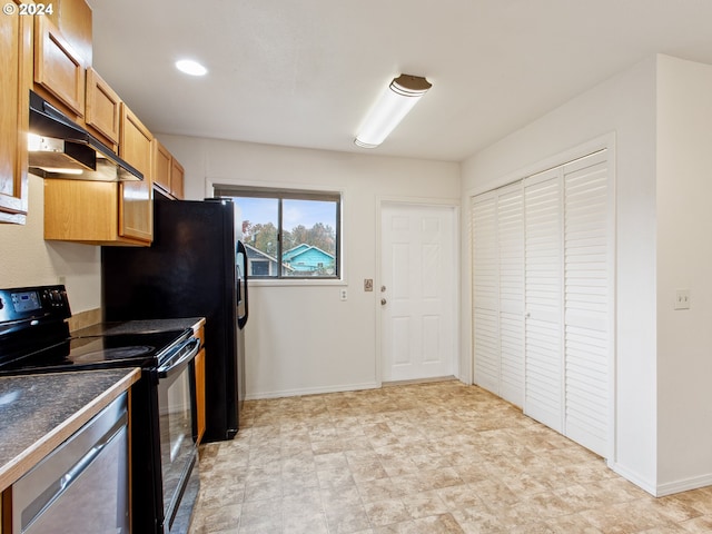 kitchen featuring electric range